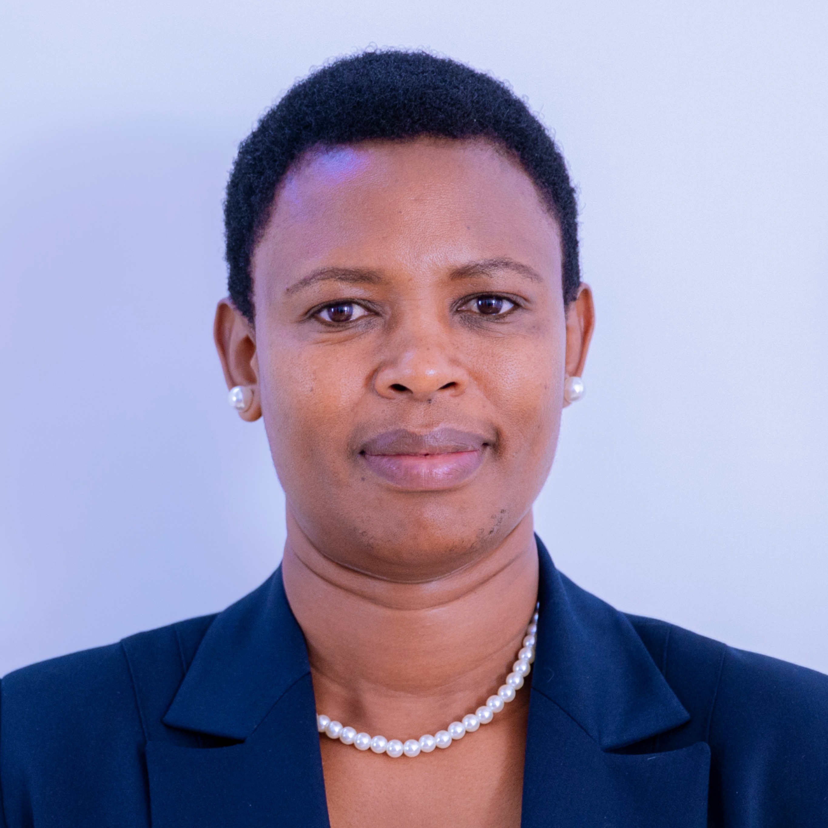 MHE. REGINA NDEGE QWARAY