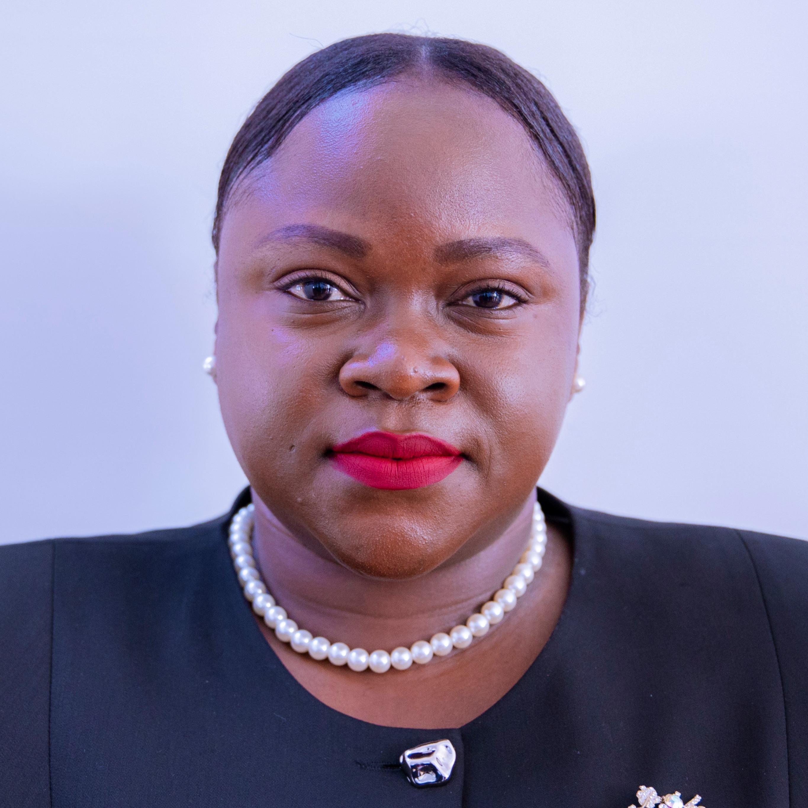 MHE. JUDITH SALVIO KAPINGA