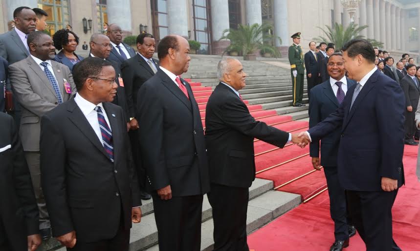President Dr.Jakaya Mrisho Kikwete introduces former OAU/AU Secretary General Salim Ahmed Salim to China’s President Xi Jinping during the formal reception held at the Great Hall of the People in Beijing this evening.Left is the Minister for Foreign Affairs Bernard Membe and second left is CCM Secretary General Abdulrahman Kinana.